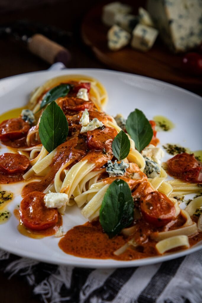A plated pasta dish, fresh out of the kitchen
